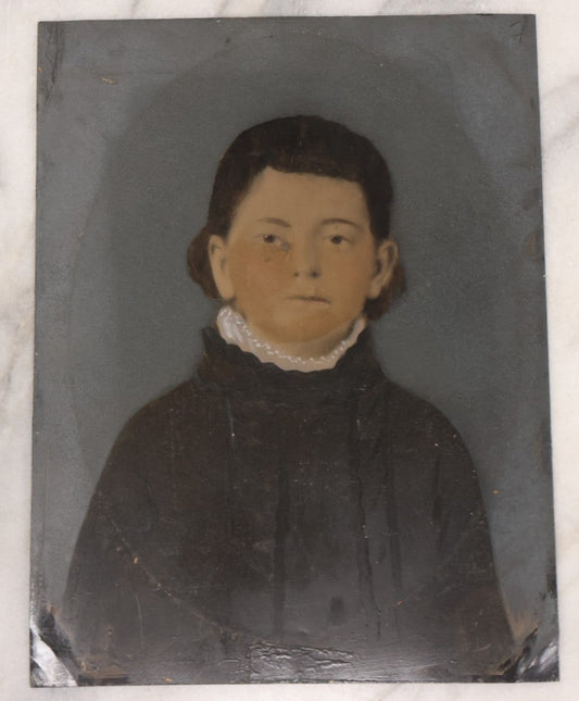 Lot 091 - Full Plate Hand Colored, Hand Tinted Tintype Of Young Child Biting Lip, White Collar, Black Shirt 