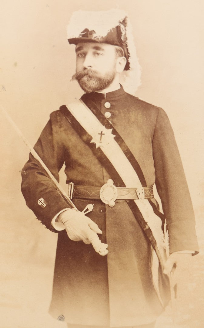 Lot 102 - Antique Cabinet Card Photograph Of A Man In Full Knights Templar Garb Posing With Dress Sword, J.U. Stead, Photographer, New York, New York