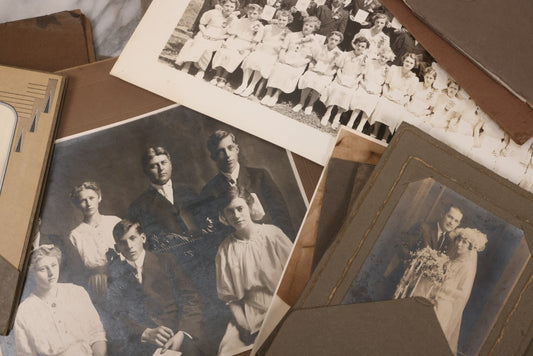 Lot 168 - Grouping Of 20+ Vintage And Antique Foldered Portrait Photographs And Other Photos, Including Wedding Portraits, Youth Basketball Teams, Large Boarded Family Portrait, And More