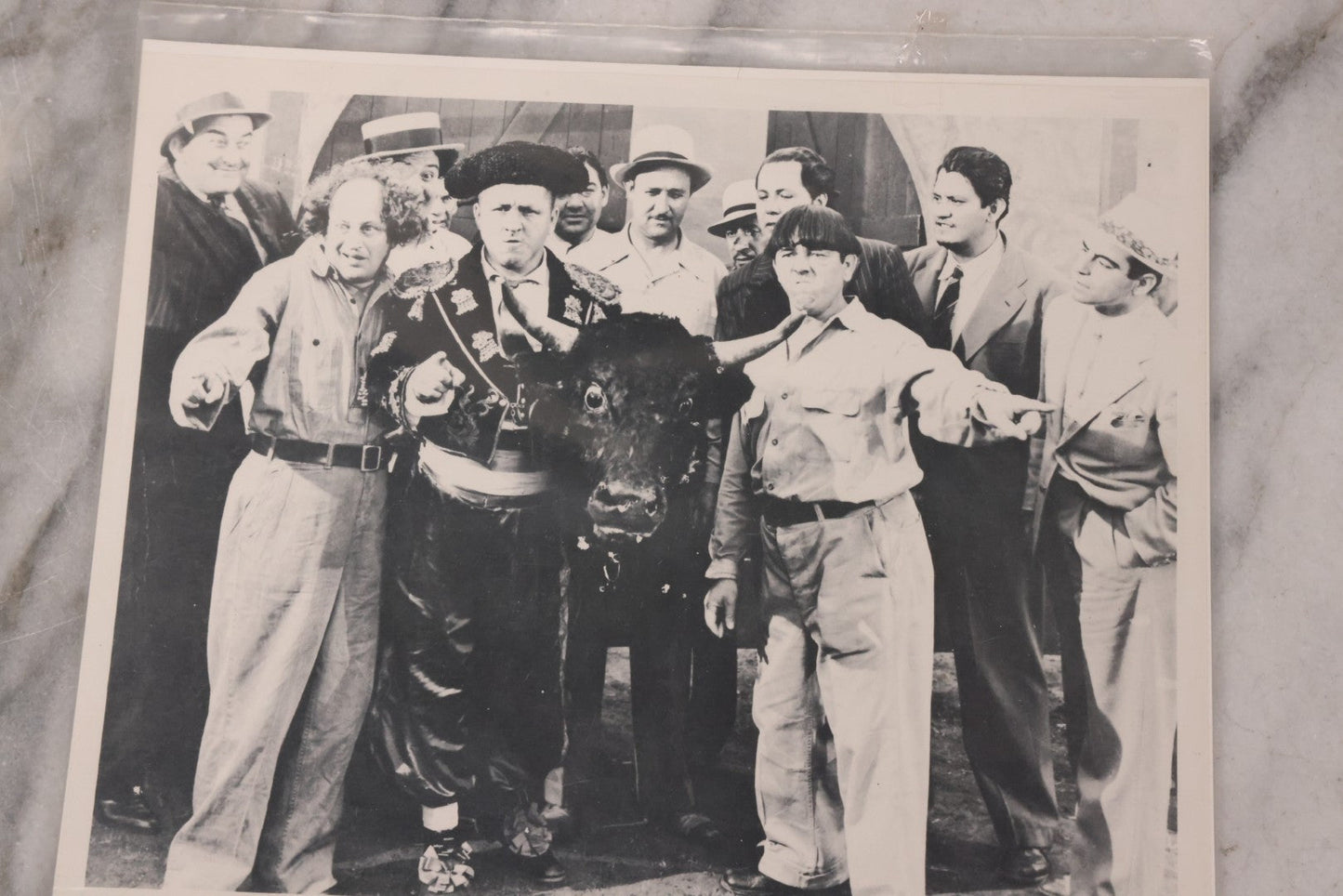 Lot 169 - Vintage Ephemera Grouping Including 18 Collectible Kiss Trading Cards, D.C. Gang Busters Comic No. 58, And Three Stooges Promo Photo