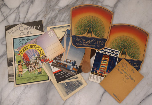 Lot 170 - Vintage Ephemera Grouping Including "Charm Of Color" Ad Fans, "All About Milk" Booklet, Chicago World's Fair Collectibles, Travel Brochures, And More