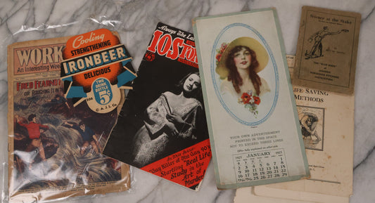 Lot 171 - Vintage And Antique Ephemera Grouping Including Ironbeer Advertisement, Horseshoe Throwing Science Book, Sample Ad Calendar From 1927, Red Cross Booklet, "Work And Win" Weekly Youth Comic, And More