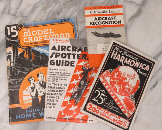 Lot 172 - Vintage Ephemera Grouping Including "New Standard Harmonica Course" Booklet, Pair Of Aircraft Guides, And Model Craftsman Booklet