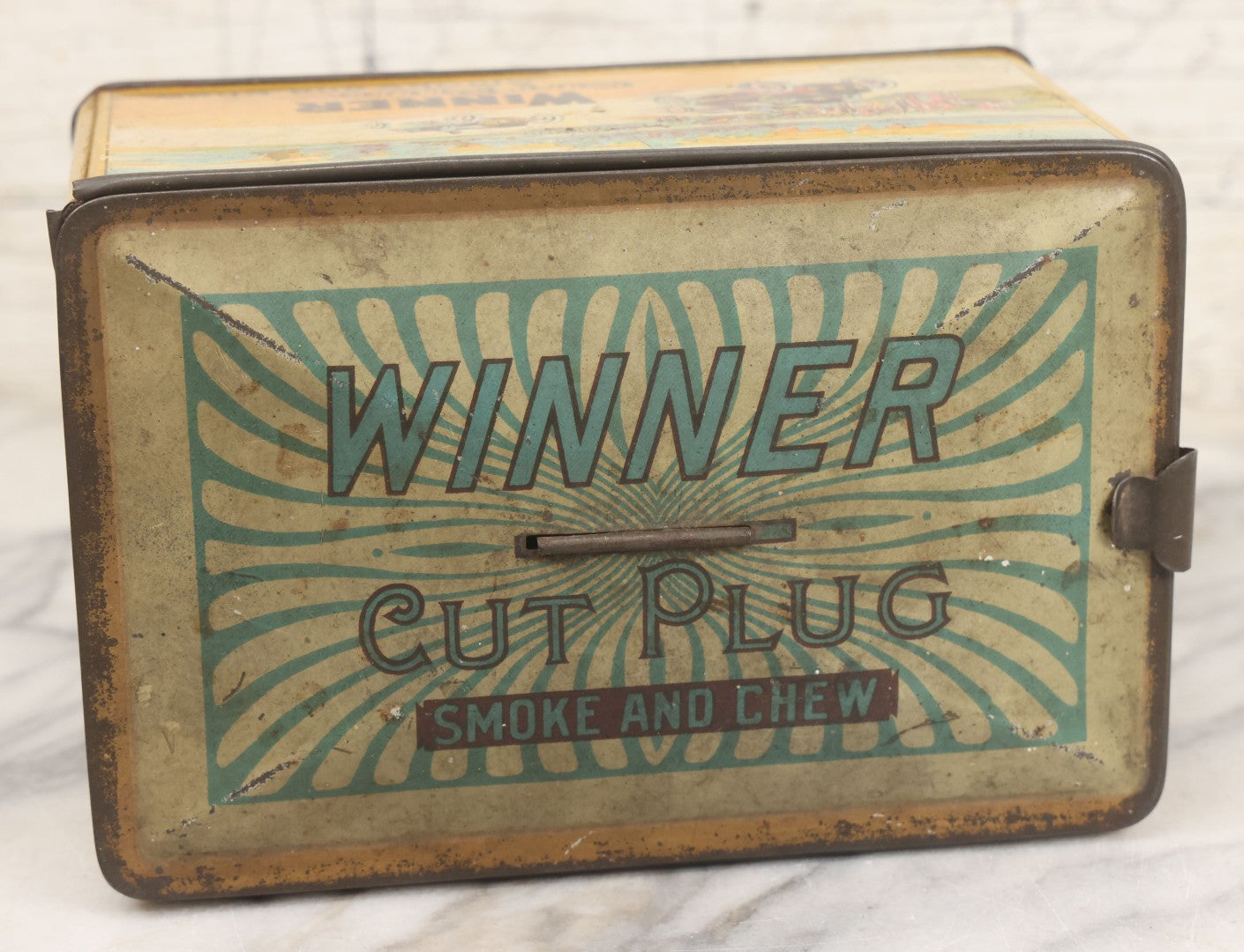 Lot 002 - Antique Tin Lithograph "Winner Cut Plug Smoke And Chew" Tobacco Tin With Auto Racing Motif, J. Wright Co., Richmond, Virginia, Circa 1910-1920, Note Missing Handle