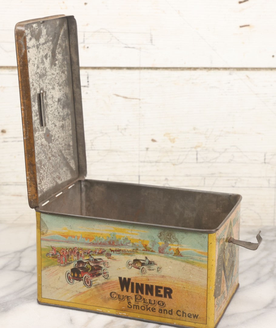 Lot 002 - Antique Tin Lithograph "Winner Cut Plug Smoke And Chew" Tobacco Tin With Auto Racing Motif, J. Wright Co., Richmond, Virginia, Circa 1910-1920, Note Missing Handle