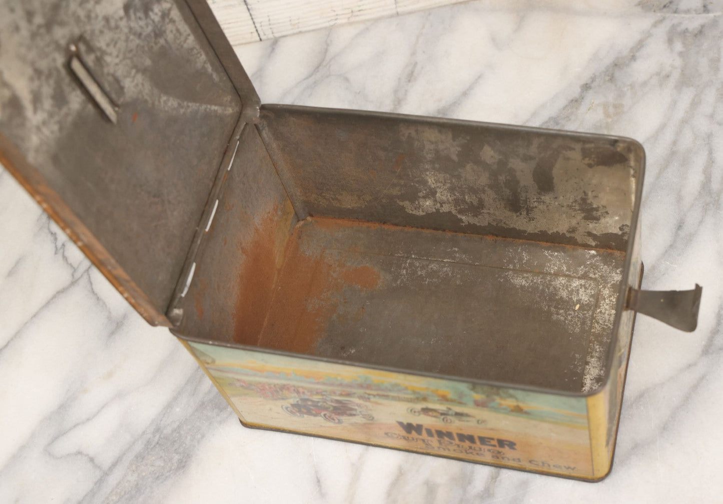 Lot 002 - Antique Tin Lithograph "Winner Cut Plug Smoke And Chew" Tobacco Tin With Auto Racing Motif, J. Wright Co., Richmond, Virginia, Circa 1910-1920, Note Missing Handle