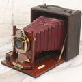 Lot 003 - Antique Cycle Poco No. 5 Folding Camera By Rochester Optical & Camera Co. With Bausch & Lomb Unicum Lens, With Three Matching Plate Holders And Original Case, Circa 1890s