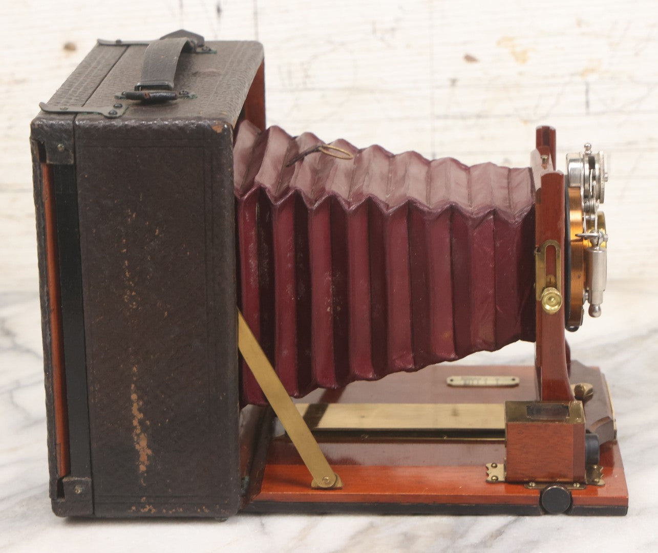 Lot 003 - Antique Cycle Poco No. 5 Folding Camera By Rochester Optical & Camera Co. With Bausch & Lomb Unicum Lens, With Three Matching Plate Holders And Original Case, Circa 1890s