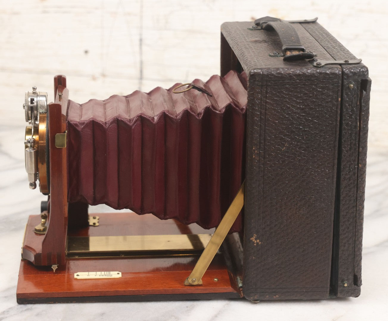 Lot 003 - Antique Cycle Poco No. 5 Folding Camera By Rochester Optical & Camera Co. With Bausch & Lomb Unicum Lens, With Three Matching Plate Holders And Original Case, Circa 1890s