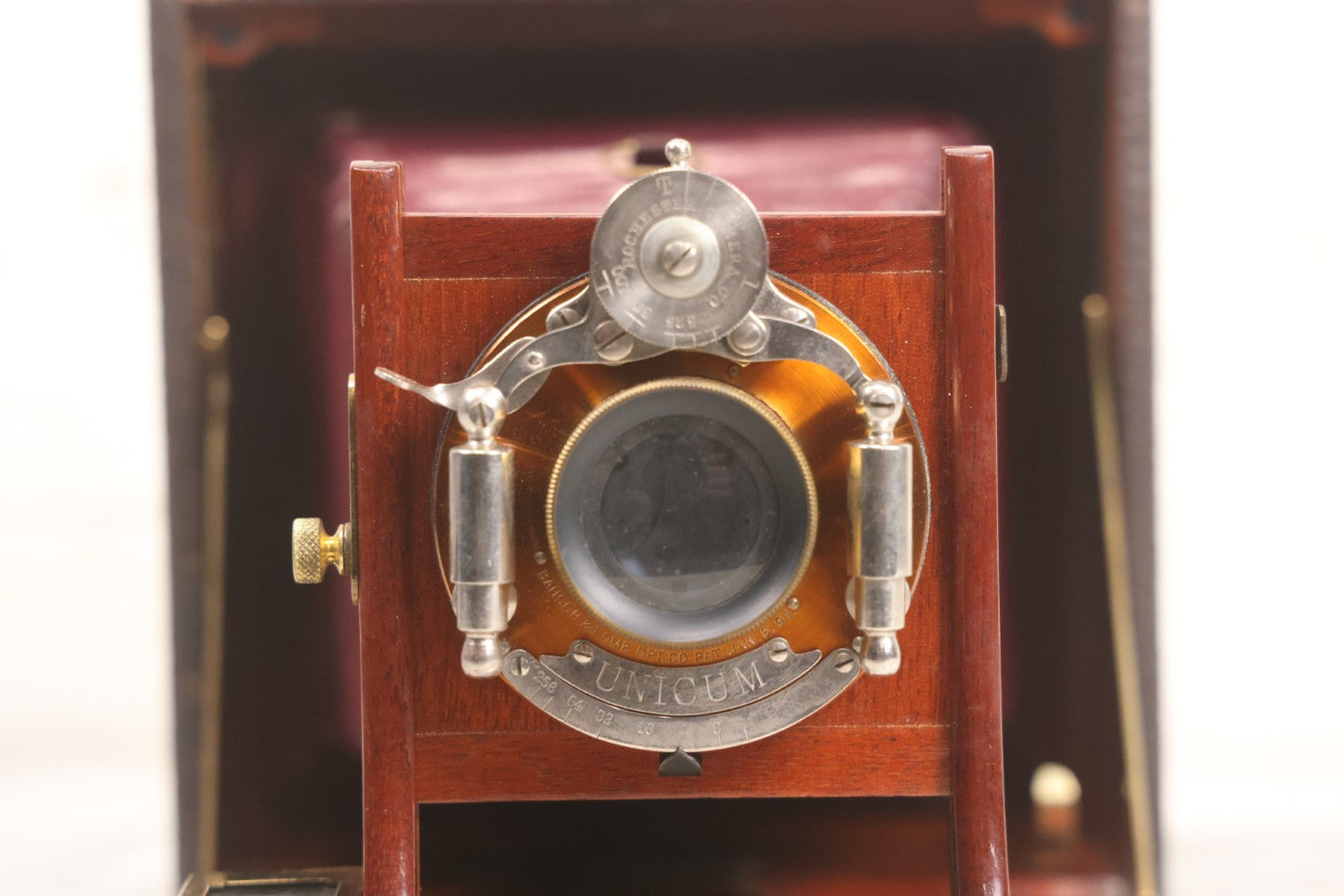 Lot 003 - Antique Cycle Poco No. 5 Folding Camera By Rochester Optical & Camera Co. With Bausch & Lomb Unicum Lens, With Three Matching Plate Holders And Original Case, Circa 1890s