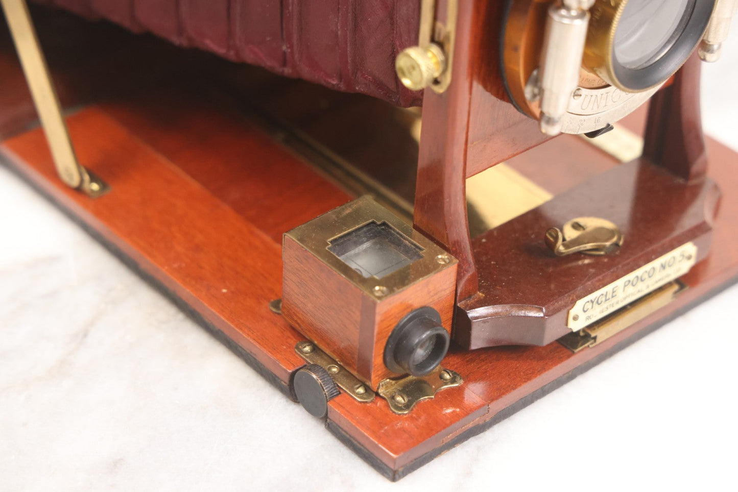 Lot 003 - Antique Cycle Poco No. 5 Folding Camera By Rochester Optical & Camera Co. With Bausch & Lomb Unicum Lens, With Three Matching Plate Holders And Original Case, Circa 1890s