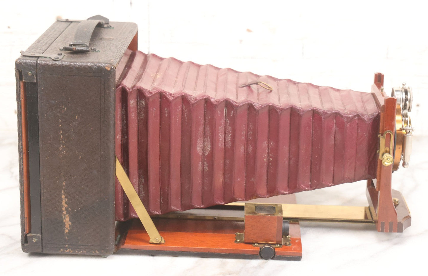 Lot 003 - Antique Cycle Poco No. 5 Folding Camera By Rochester Optical & Camera Co. With Bausch & Lomb Unicum Lens, With Three Matching Plate Holders And Original Case, Circa 1890s