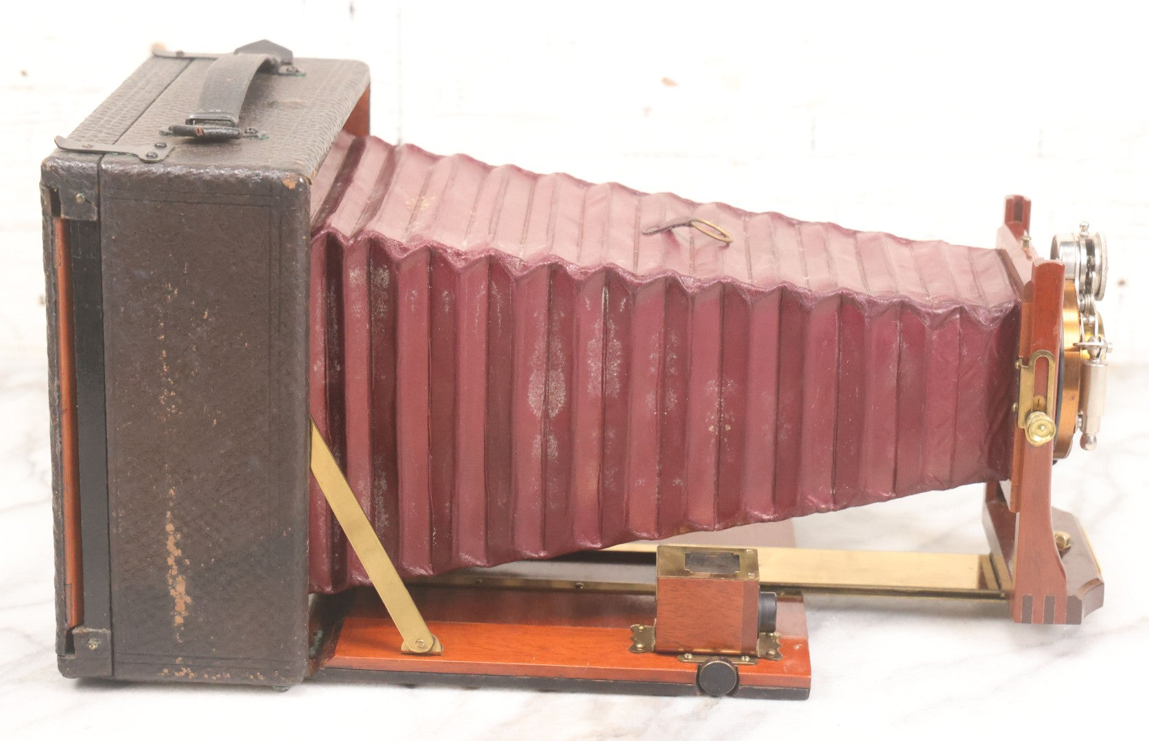 Lot 003 - Antique Cycle Poco No. 5 Folding Camera By Rochester Optical & Camera Co. With Bausch & Lomb Unicum Lens, With Three Matching Plate Holders And Original Case, Circa 1890s