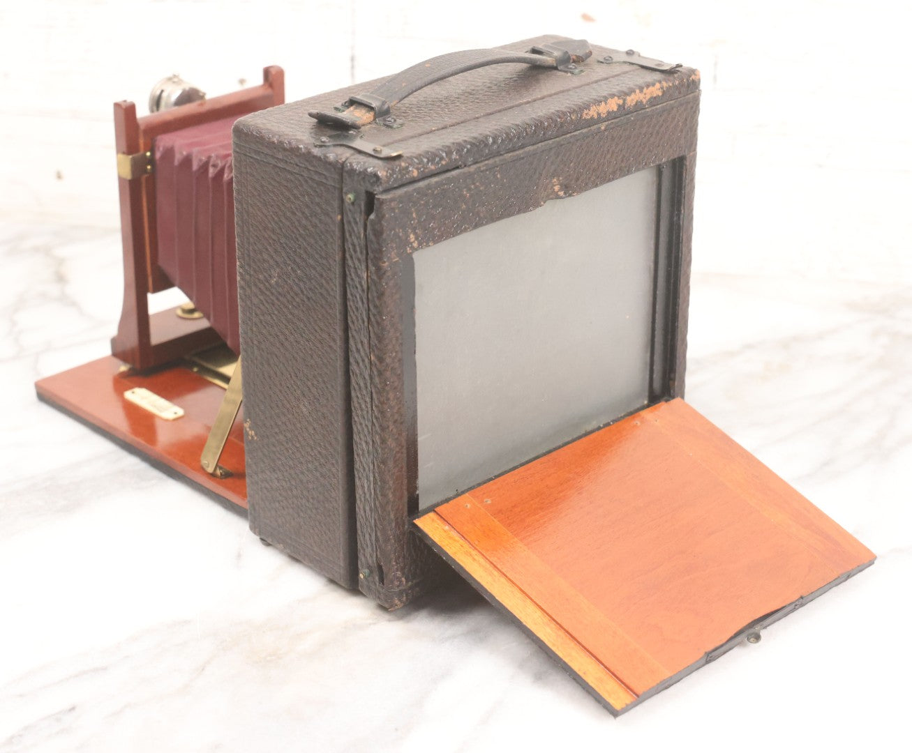 Lot 003 - Antique Cycle Poco No. 5 Folding Camera By Rochester Optical & Camera Co. With Bausch & Lomb Unicum Lens, With Three Matching Plate Holders And Original Case, Circa 1890s