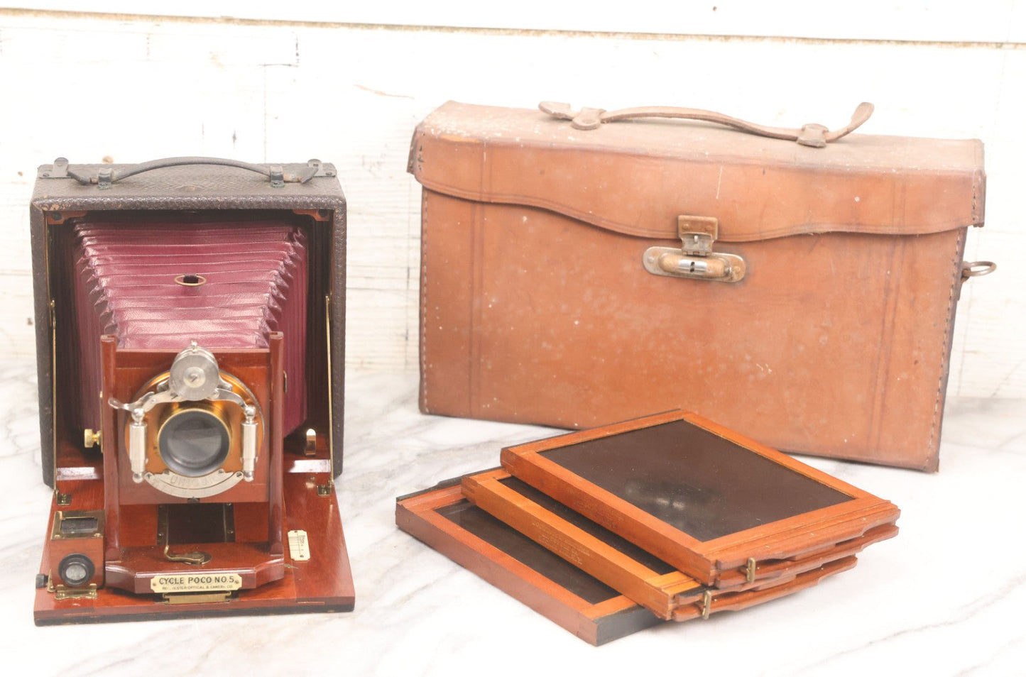 Lot 003 - Antique Cycle Poco No. 5 Folding Camera By Rochester Optical & Camera Co. With Bausch & Lomb Unicum Lens, With Three Matching Plate Holders And Original Case, Circa 1890s