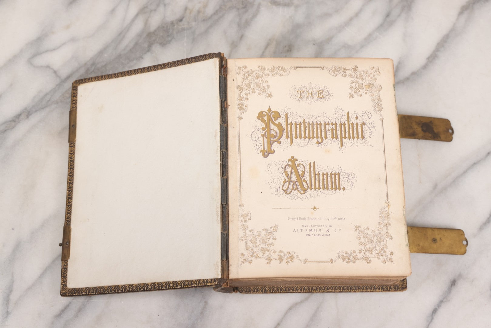 Lot 005 - Antique Unused Finely Bound Antique Photo Album For Tintype, Carte De Visite, And Cabinet Card Photographs, "The Photographic Album" Manufactured By Altemus & Co., Philadelphia, Patented July 21st, 1863, With Custom L.A.N.E. Monogram