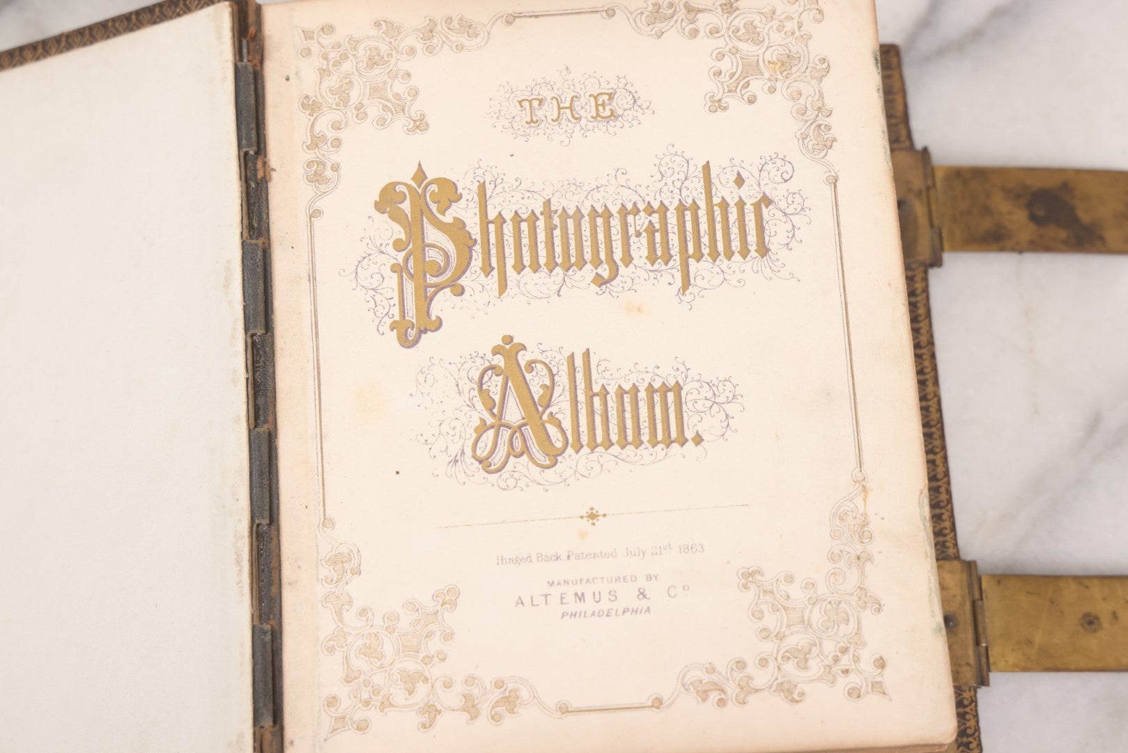 Lot 005 - Antique Unused Finely Bound Antique Photo Album For Tintype, Carte De Visite, And Cabinet Card Photographs, "The Photographic Album" Manufactured By Altemus & Co., Philadelphia, Patented July 21st, 1863, With Custom L.A.N.E. Monogram
