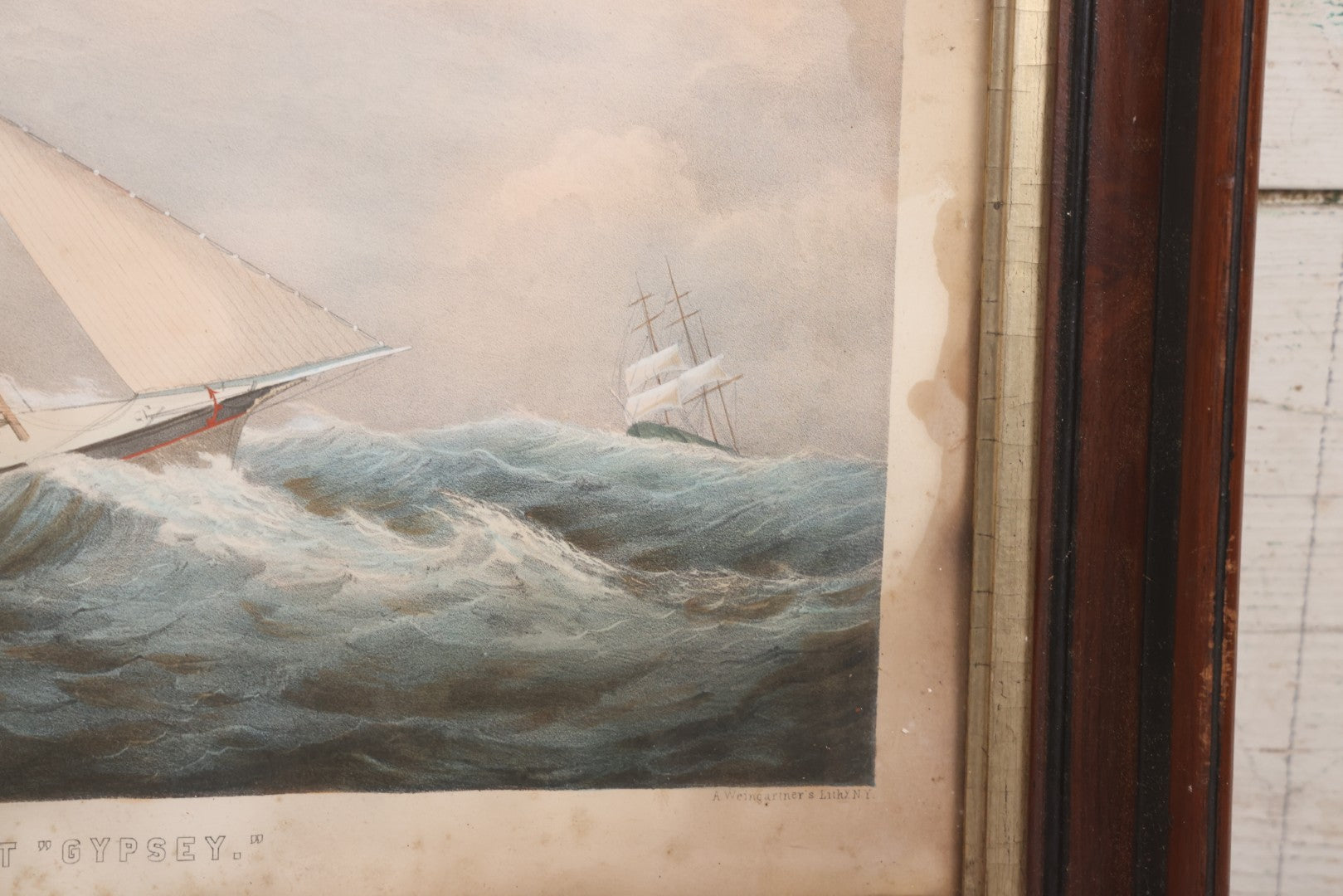 Lot 013 - Antique Hand Colored Lithograph Of Sailing Ship In Choppy Waters, Titled "Pilot Boat 'Gypsey,'" Lithographed By A. Weingartner's Lithography, New York, After A Painting By C. Drew, In Period Deep Walnut Frame, 21-3/8" x 17-7/8"