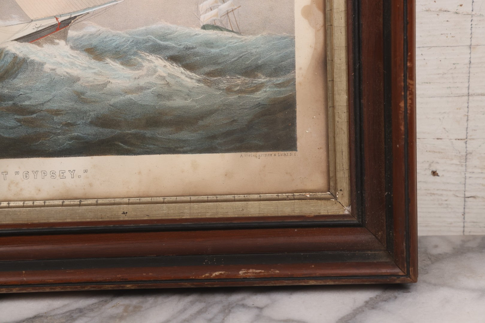 Lot 013 - Antique Hand Colored Lithograph Of Sailing Ship In Choppy Waters, Titled "Pilot Boat 'Gypsey,'" Lithographed By A. Weingartner's Lithography, New York, After A Painting By C. Drew, In Period Deep Walnut Frame, 21-3/8" x 17-7/8"