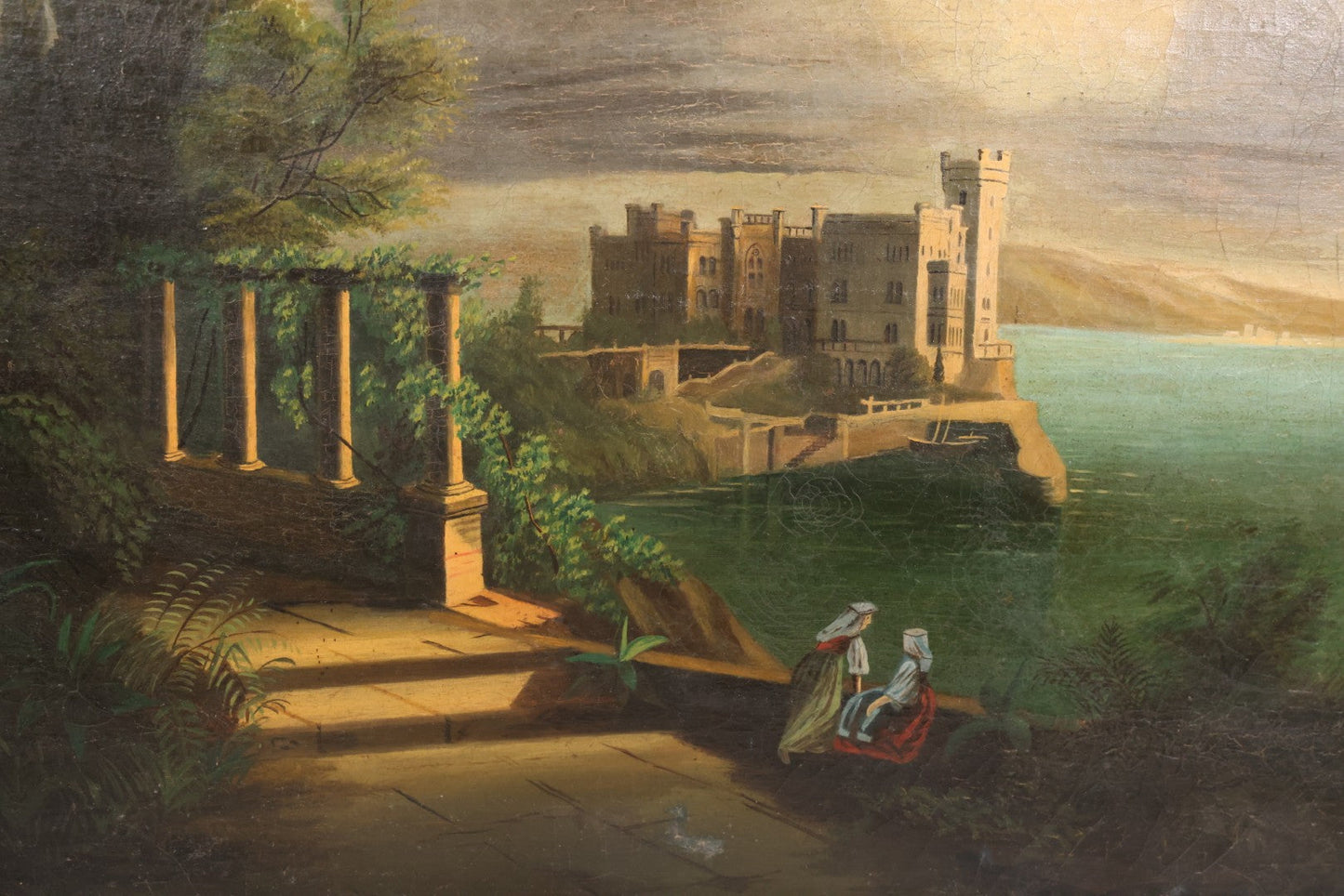 Lot 015 - Antique European Oil On Canvas Painting Landscape Scene Depicting Seaside Castle With Maidens Looking Toward The Coast From Stone Ruins, Mountains And Sailboats In The Distance, Cloudy Sky, Circa Early 19th Century, 24" x 18"