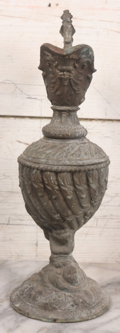 Lot 020 - Antique Spelter White Metal Gothic Style Ewer With Green Man Motif, Figural Child Base, Former Lamp Conversion, 14-1/2" Height