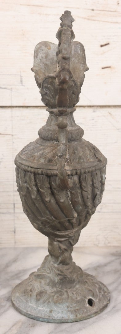 Lot 020 - Antique Spelter White Metal Gothic Style Ewer With Green Man Motif, Figural Child Base, Former Lamp Conversion, 14-1/2" Height