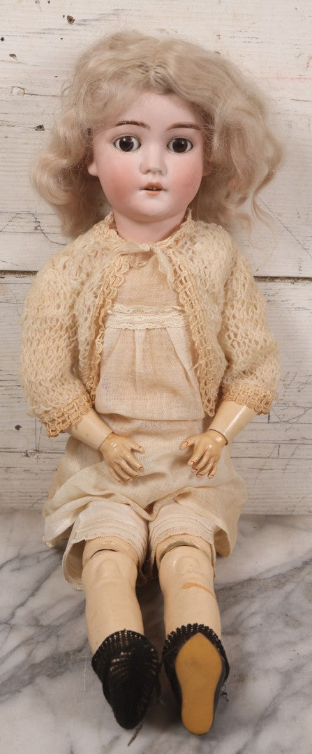 Lot 022 - Antique German Bisque Head Doll By Adolf Wislizenus, Marked "A.W. Special," Made In Germany, With Composition Body, Blonde Wig, And Clothing, Circa 1900, 24" Height