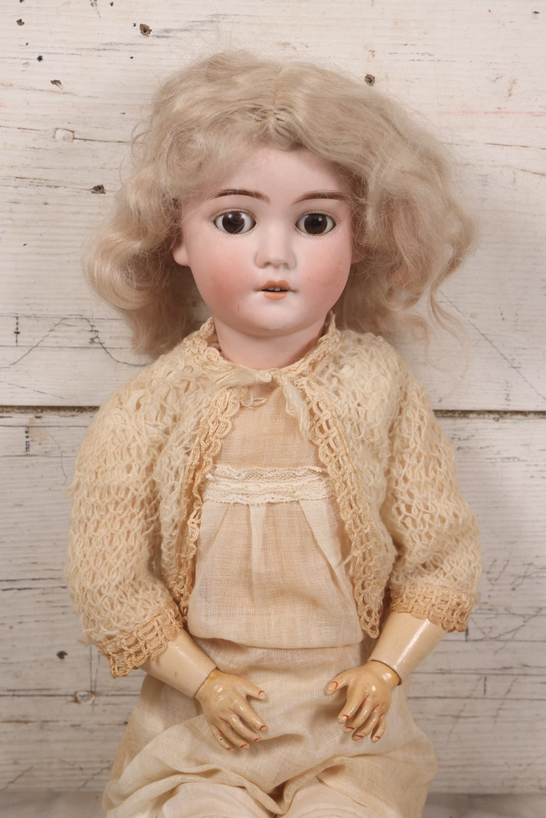 Lot 022 - Antique German Bisque Head Doll By Adolf Wislizenus, Marked "A.W. Special," Made In Germany, With Composition Body, Blonde Wig, And Clothing, Circa 1900, 24" Height
