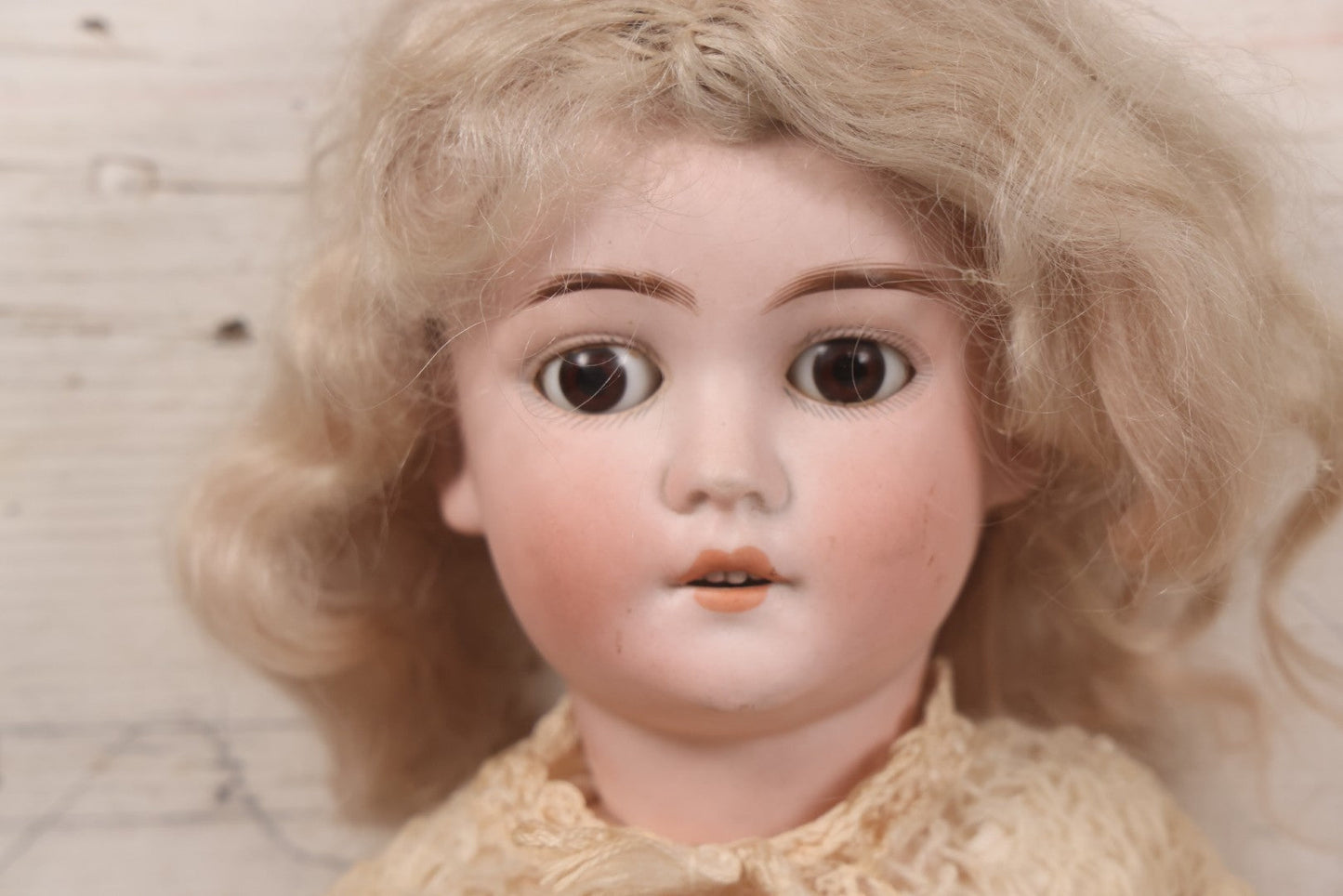 Lot 022 - Antique German Bisque Head Doll By Adolf Wislizenus, Marked "A.W. Special," Made In Germany, With Composition Body, Blonde Wig, And Clothing, Circa 1900, 24" Height