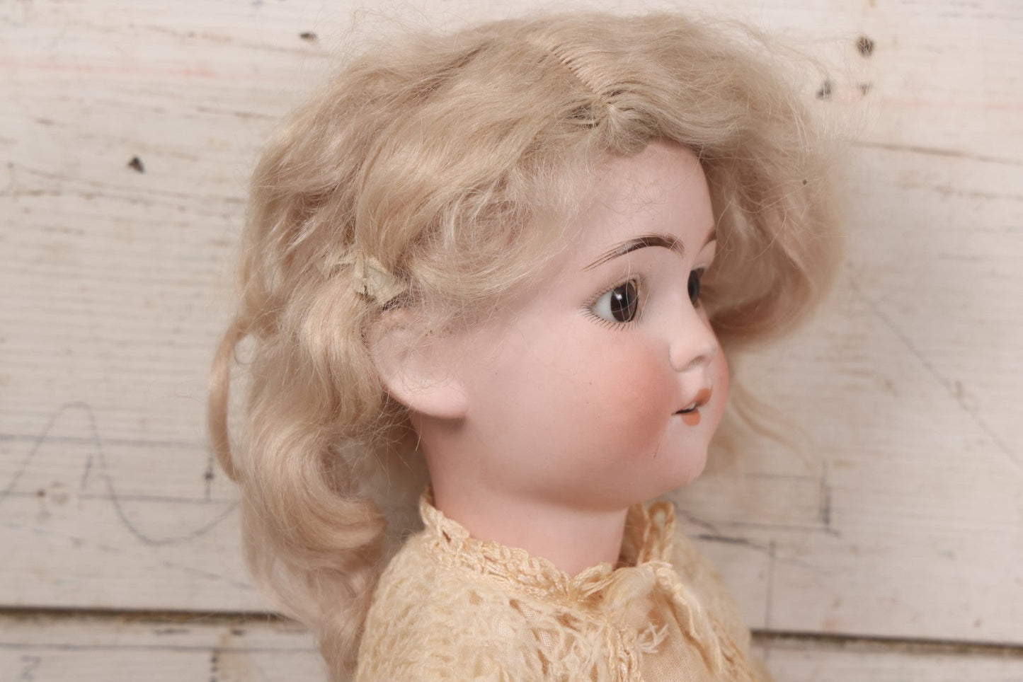 Lot 022 - Antique German Bisque Head Doll By Adolf Wislizenus, Marked "A.W. Special," Made In Germany, With Composition Body, Blonde Wig, And Clothing, Circa 1900, 24" Height
