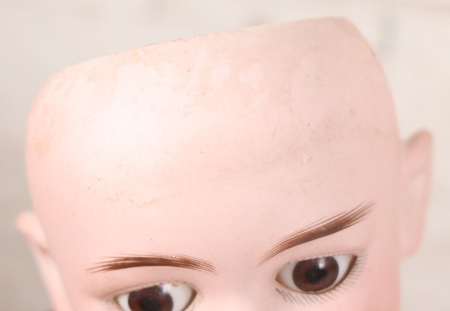 Lot 022 - Antique German Bisque Head Doll By Adolf Wislizenus, Marked "A.W. Special," Made In Germany, With Composition Body, Blonde Wig, And Clothing, Circa 1900, 24" Height