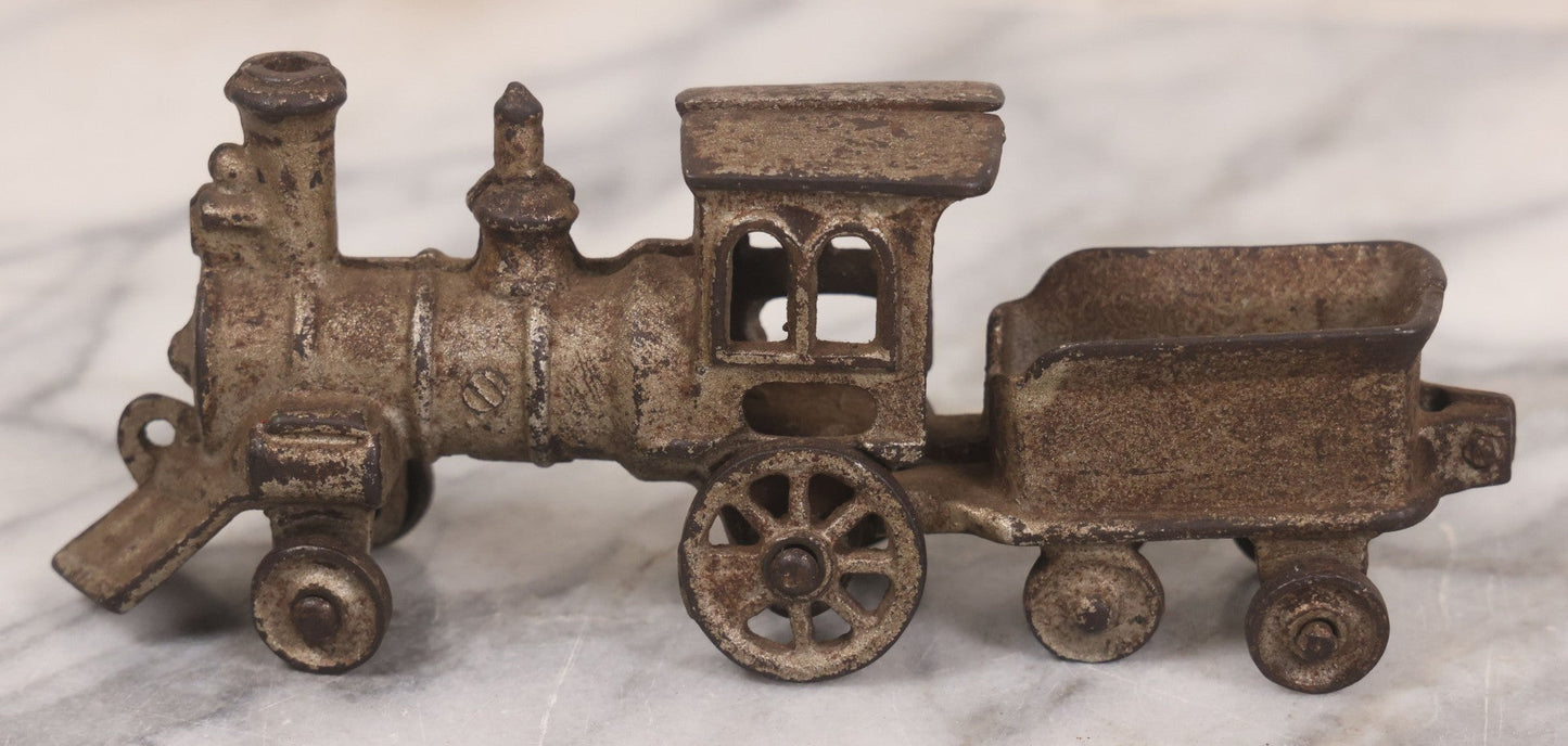 Lot 031 - Vintage Cast Iron Toy Train With Locomotive, Tender, And Passenger Car, Remnants Of Original Silver Paint