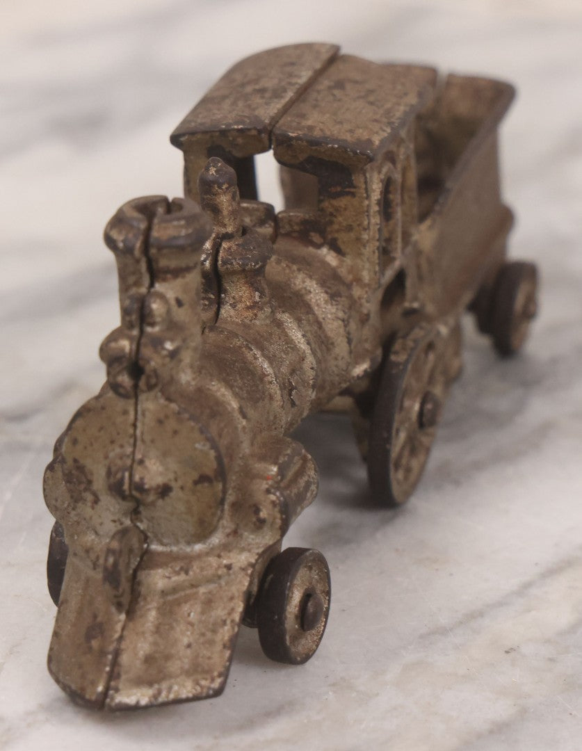 Lot 031 - Vintage Cast Iron Toy Train With Locomotive, Tender, And Passenger Car, Remnants Of Original Silver Paint