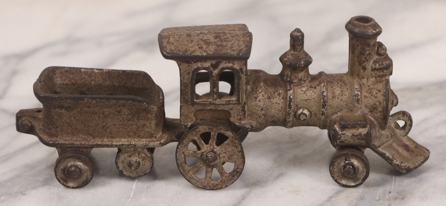 Lot 031 - Vintage Cast Iron Toy Train With Locomotive, Tender, And Passenger Car, Remnants Of Original Silver Paint