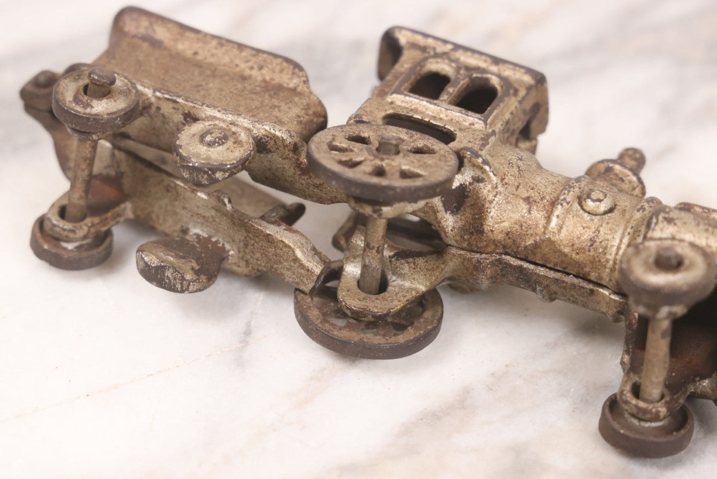 Lot 031 - Vintage Cast Iron Toy Train With Locomotive, Tender, And Passenger Car, Remnants Of Original Silver Paint