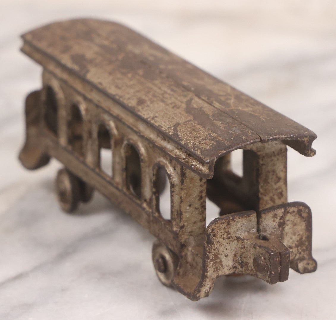 Lot 031 - Vintage Cast Iron Toy Train With Locomotive, Tender, And Passenger Car, Remnants Of Original Silver Paint