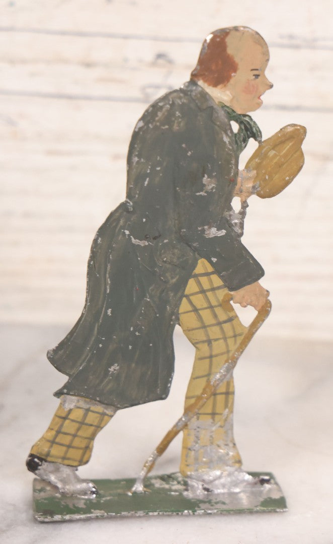 Lot 034 - Single Antique German Zinnfiguren Flat Pewter Figure Of Scholarly Man In Checkered Pants, Hat, And Cane, Hand Painted