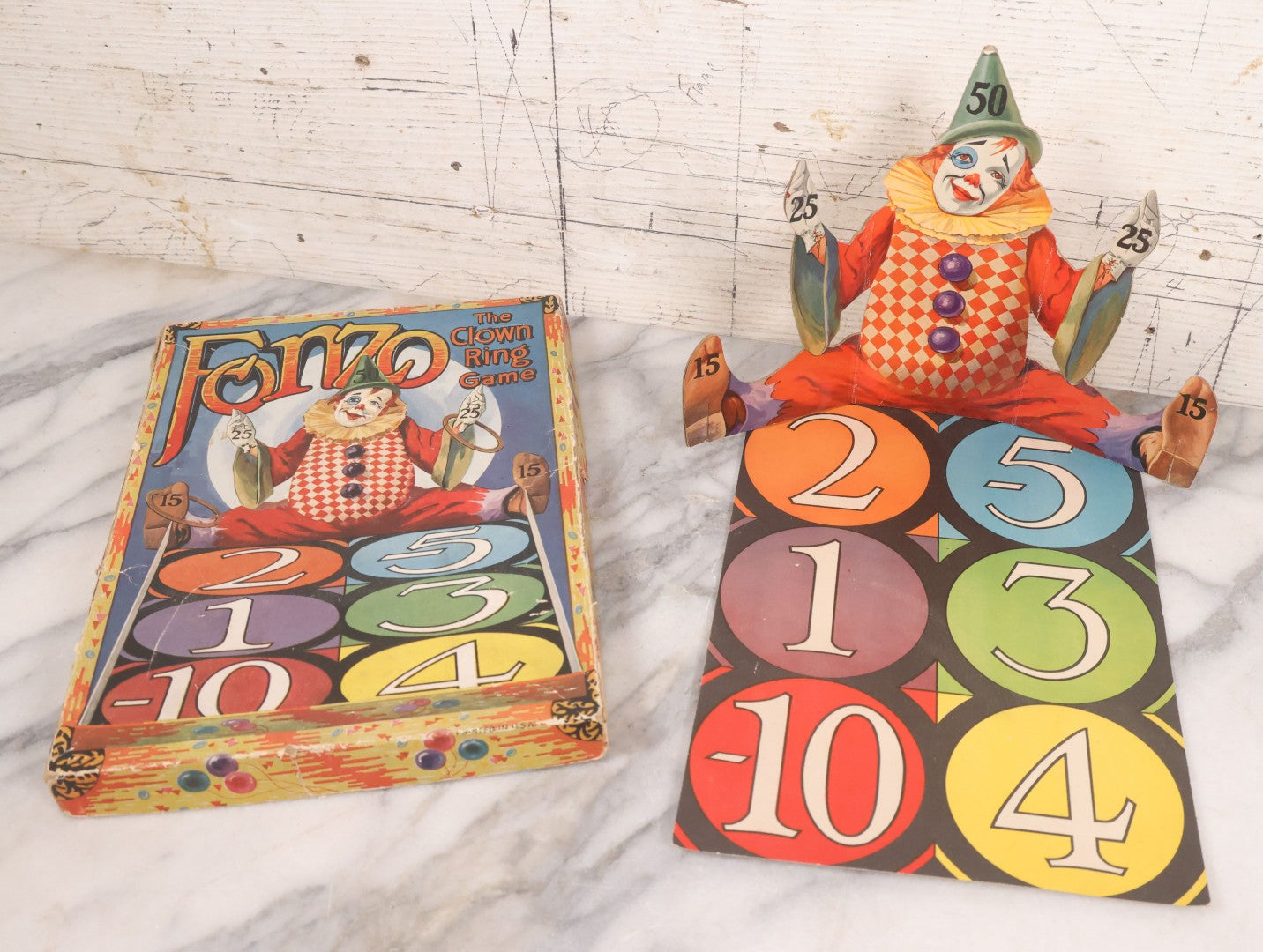 Lot 037 - Vintage "Fonzo, The Clown Ring Game" Children's Board Game With Die Cut Clown, Number Pad, And Original Box, Printed In U.S.A., No. 15