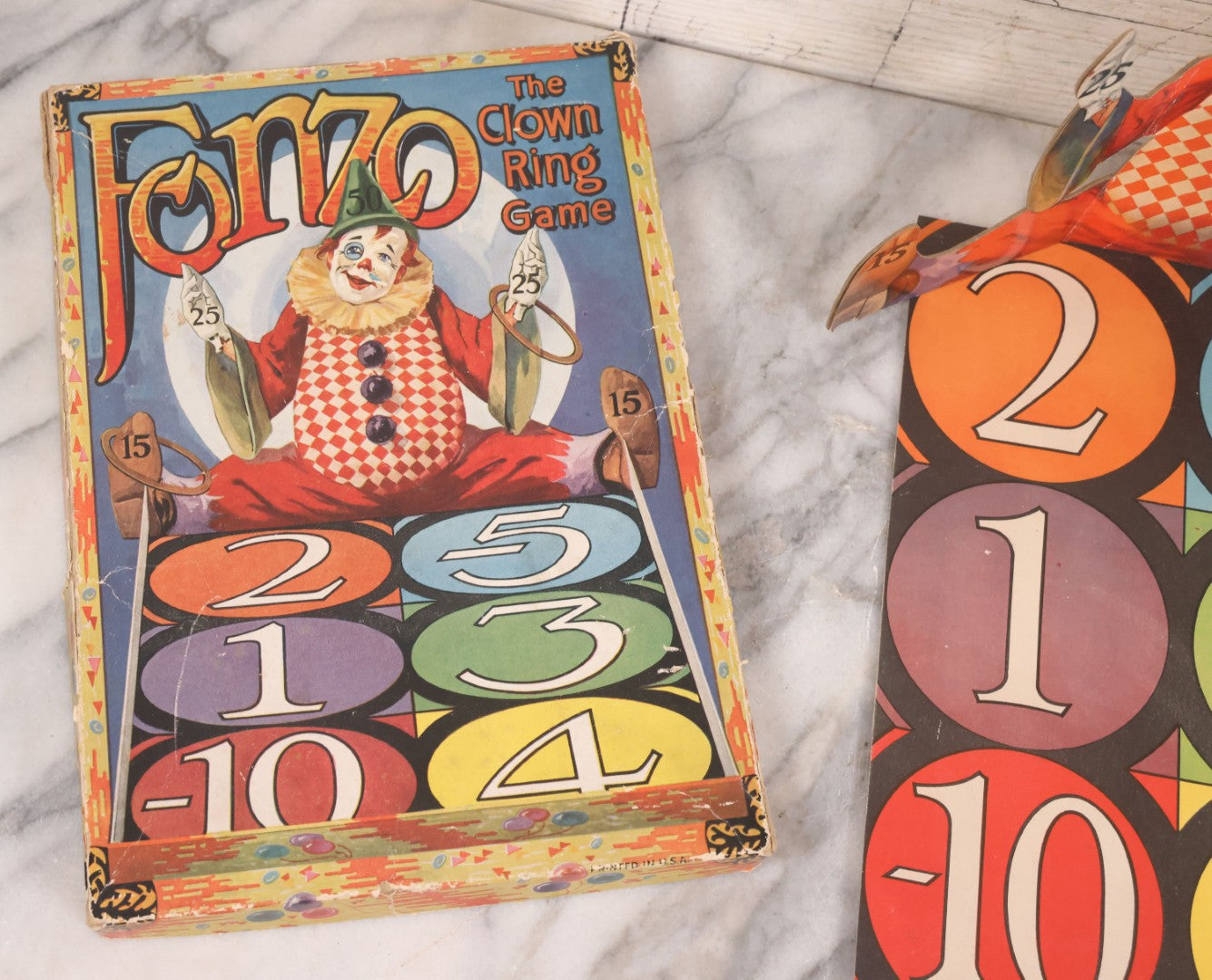 Lot 037 - Vintage "Fonzo, The Clown Ring Game" Children's Board Game With Die Cut Clown, Number Pad, And Original Box, Printed In U.S.A., No. 15
