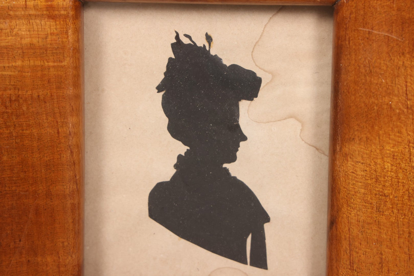 Lot 047 - Antique Folk Art Hand Cut Paper Silhouette Of Woman In Wide Tiger Maple Frame, Note Water Damage, 7-1/2" x 8"