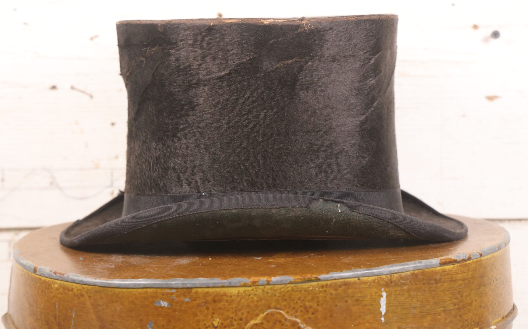 Lot 049 - Antique Beaverskin Stove Pipe Top Hat Manufactured By Alfred Matthews, St. Louis, Missouri, With Dark Mustard Painted Tin Hat Box With Blue-Green Interior