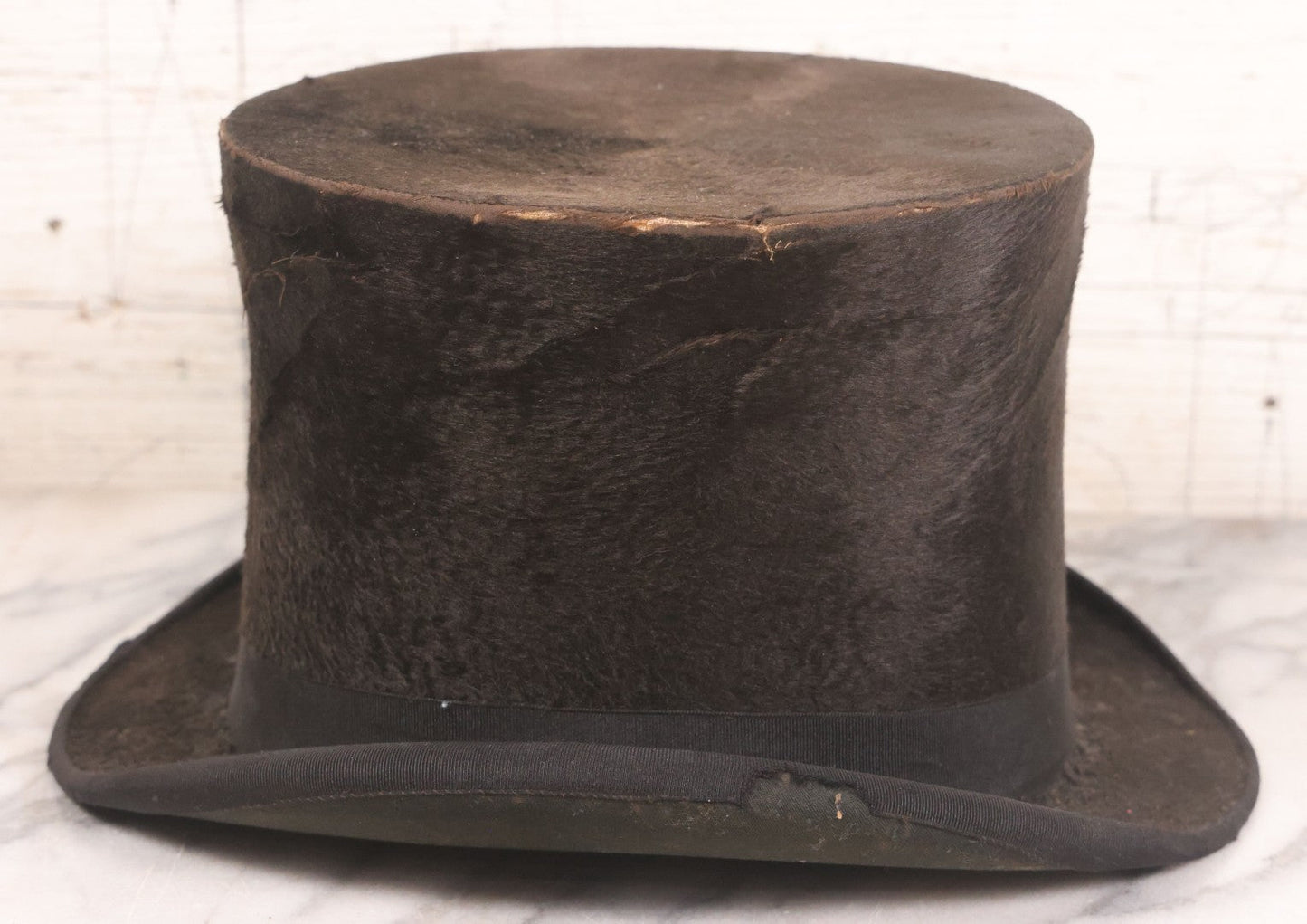 Lot 049 - Antique Beaverskin Stove Pipe Top Hat Manufactured By Alfred Matthews, St. Louis, Missouri, With Dark Mustard Painted Tin Hat Box With Blue-Green Interior