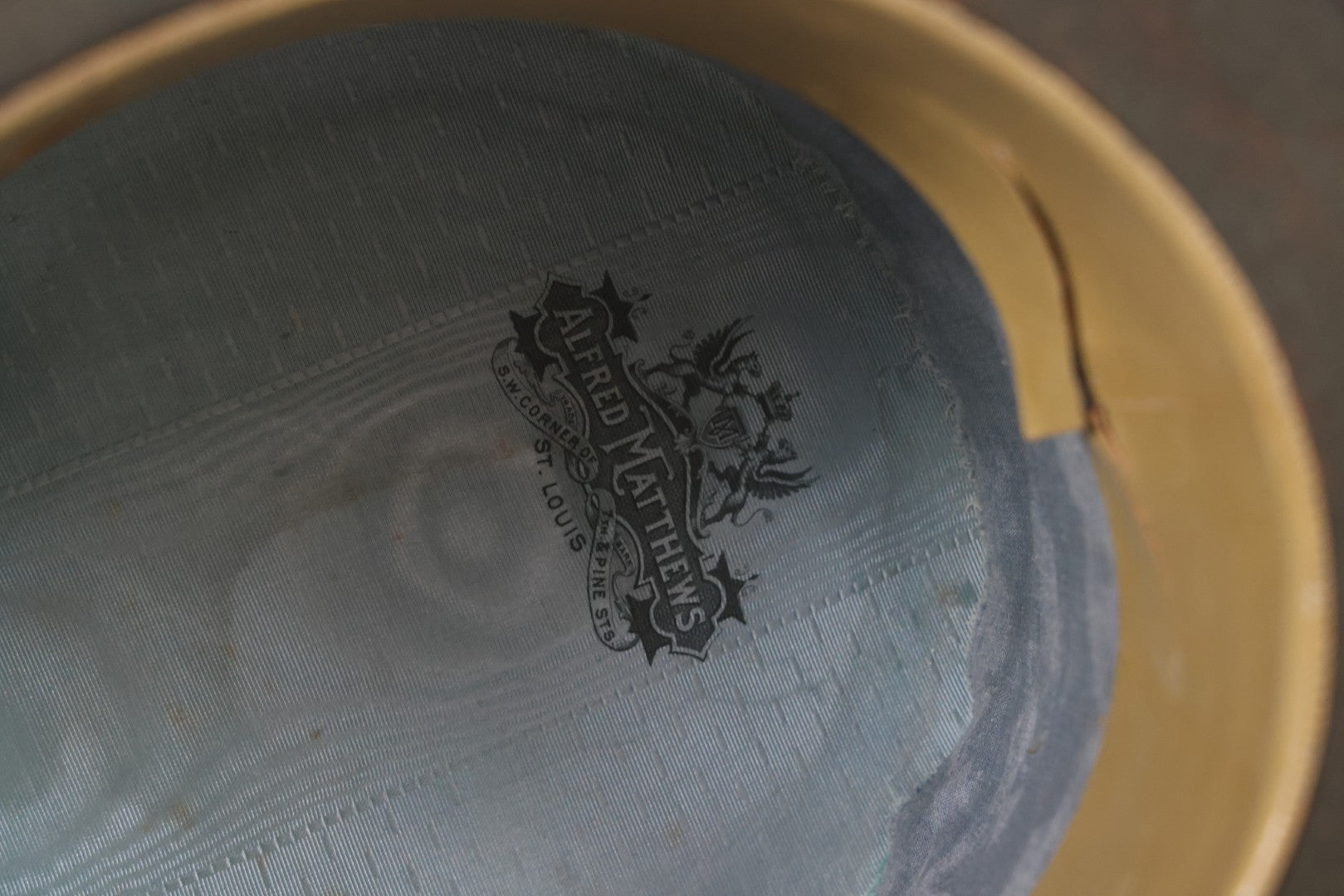 Lot 049 - Antique Beaverskin Stove Pipe Top Hat Manufactured By Alfred Matthews, St. Louis, Missouri, With Dark Mustard Painted Tin Hat Box With Blue-Green Interior