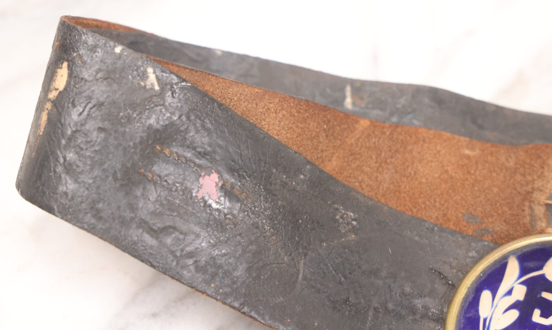 Lot 053 - Antique Leather Belt With Unusual Reverse Painted Glass Enamel Roundel With Laurel Motif, Mirrored Lettering, Unknown Fraternal Order, Circa Late 19th Century