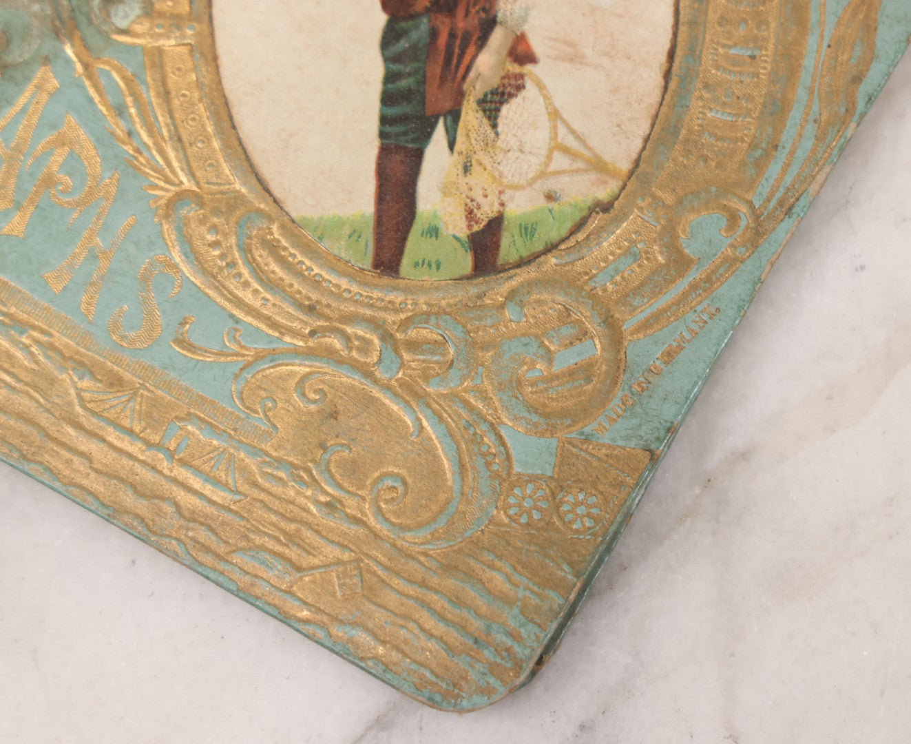 Lot 055 - Antique Victorian Autograph Album With Statue Of Liberty, New York Harbor, Hudson River Themed Embossed Gilt Cover, Cherub Flying On Bee Frontispiece, With Many Autographs From The 1890s Made In Germany