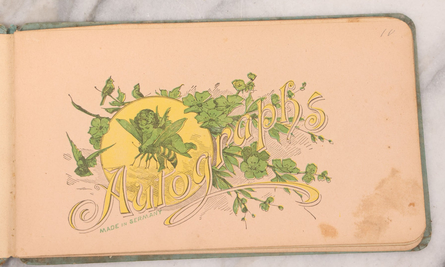 Lot 055 - Antique Victorian Autograph Album With Statue Of Liberty, New York Harbor, Hudson River Themed Embossed Gilt Cover, Cherub Flying On Bee Frontispiece, With Many Autographs From The 1890s Made In Germany