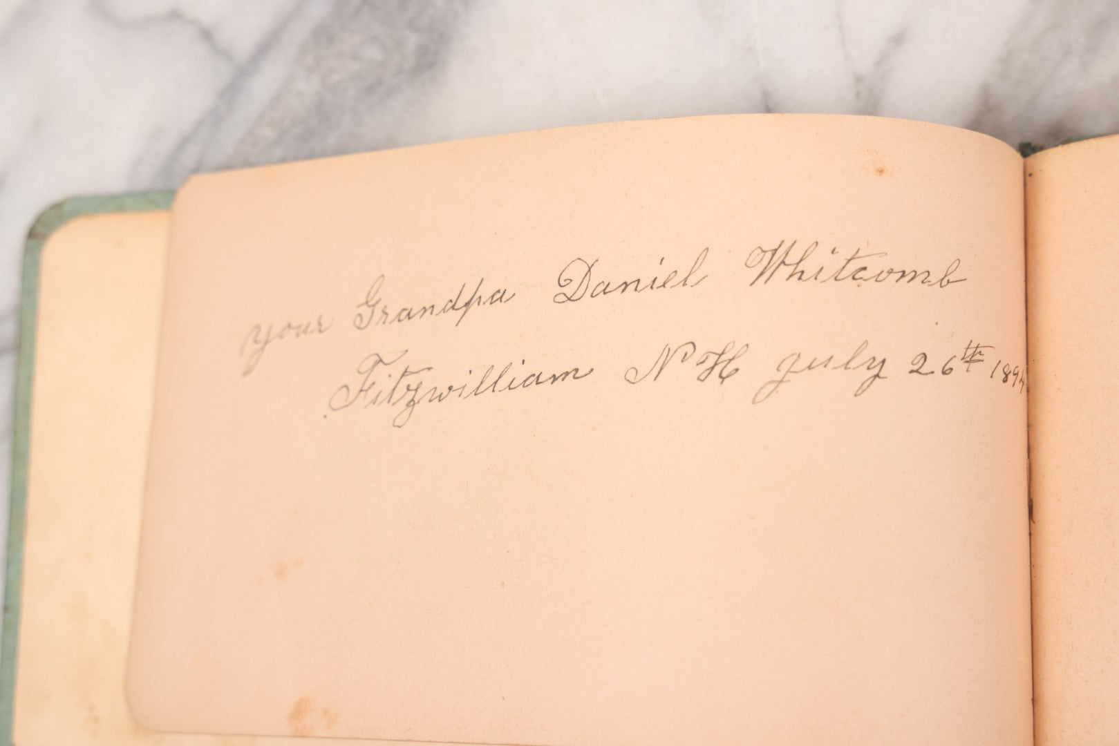 Lot 055 - Antique Victorian Autograph Album With Statue Of Liberty, New York Harbor, Hudson River Themed Embossed Gilt Cover, Cherub Flying On Bee Frontispiece, With Many Autographs From The 1890s Made In Germany