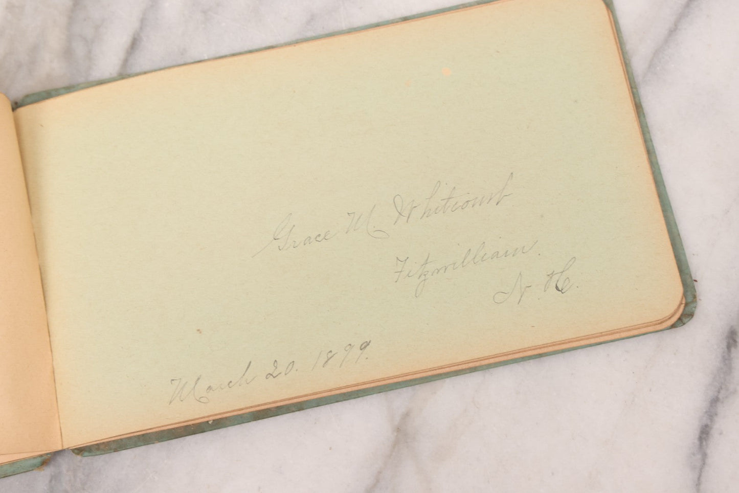 Lot 055 - Antique Victorian Autograph Album With Statue Of Liberty, New York Harbor, Hudson River Themed Embossed Gilt Cover, Cherub Flying On Bee Frontispiece, With Many Autographs From The 1890s Made In Germany