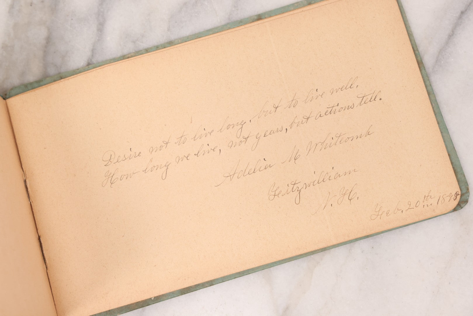 Lot 055 - Antique Victorian Autograph Album With Statue Of Liberty, New York Harbor, Hudson River Themed Embossed Gilt Cover, Cherub Flying On Bee Frontispiece, With Many Autographs From The 1890s Made In Germany