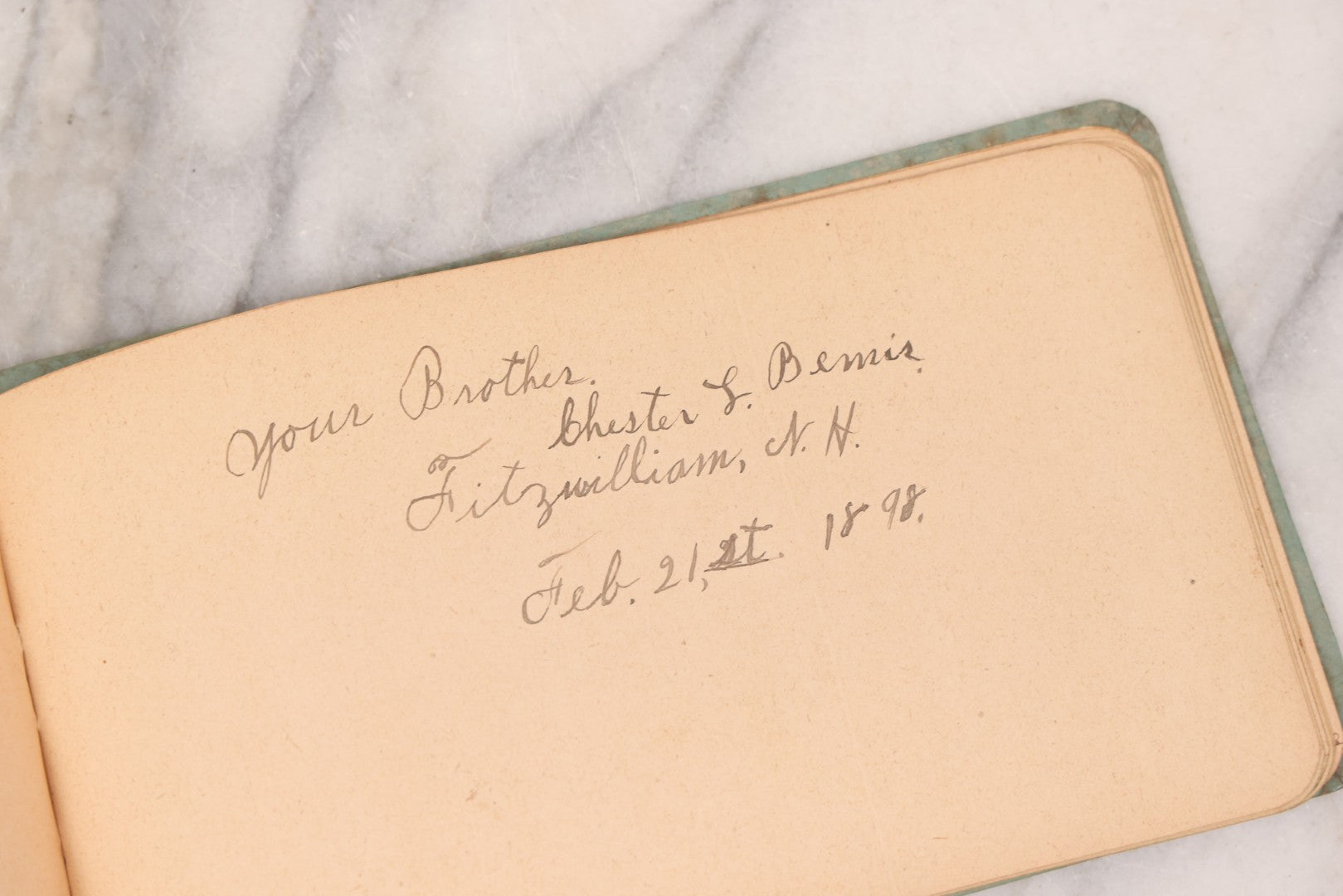 Lot 055 - Antique Victorian Autograph Album With Statue Of Liberty, New York Harbor, Hudson River Themed Embossed Gilt Cover, Cherub Flying On Bee Frontispiece, With Many Autographs From The 1890s Made In Germany